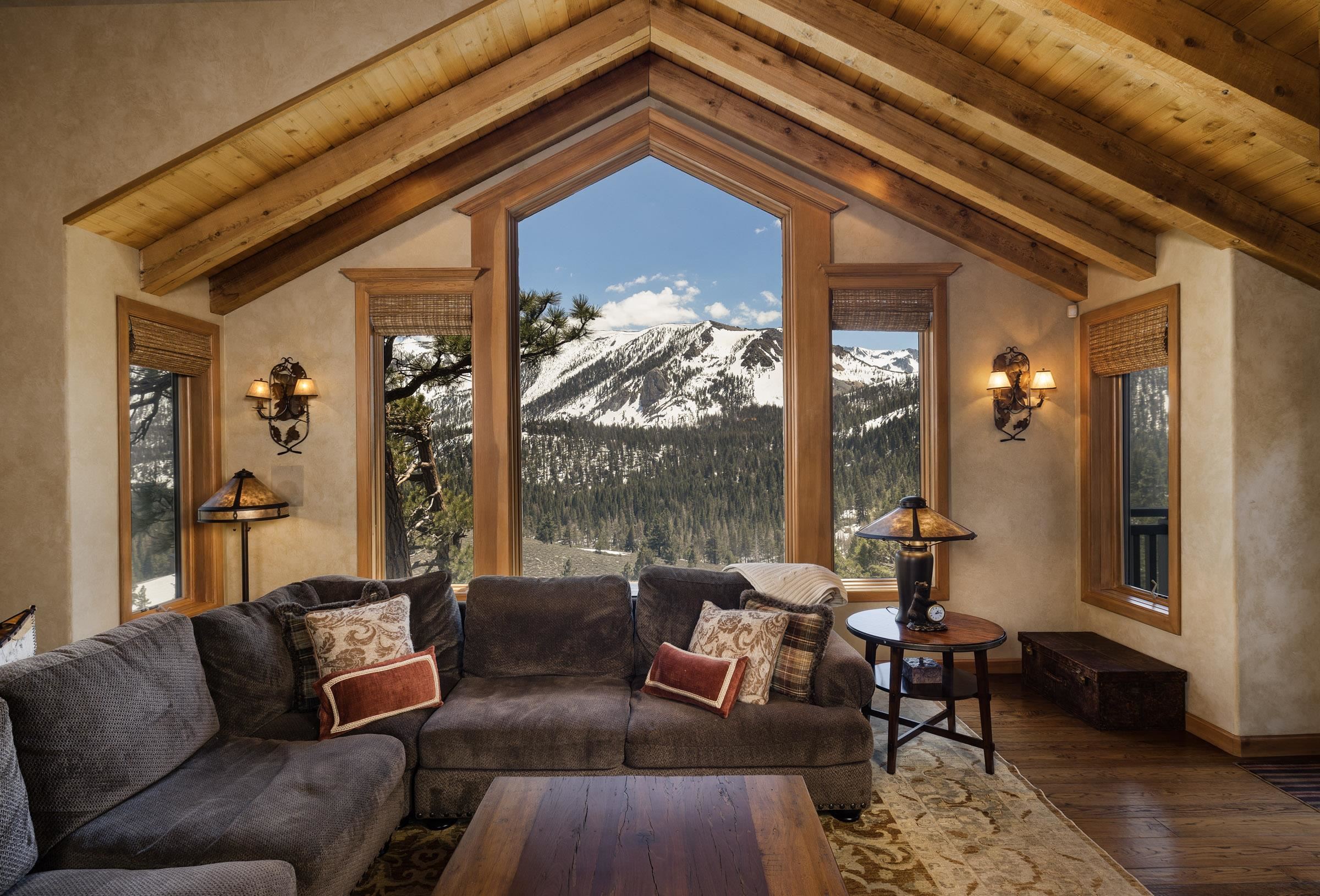 285 Juniper Road Mammoth Lakes, CA 93546 - Photo 7 of 38 a living room with furniture and a large window