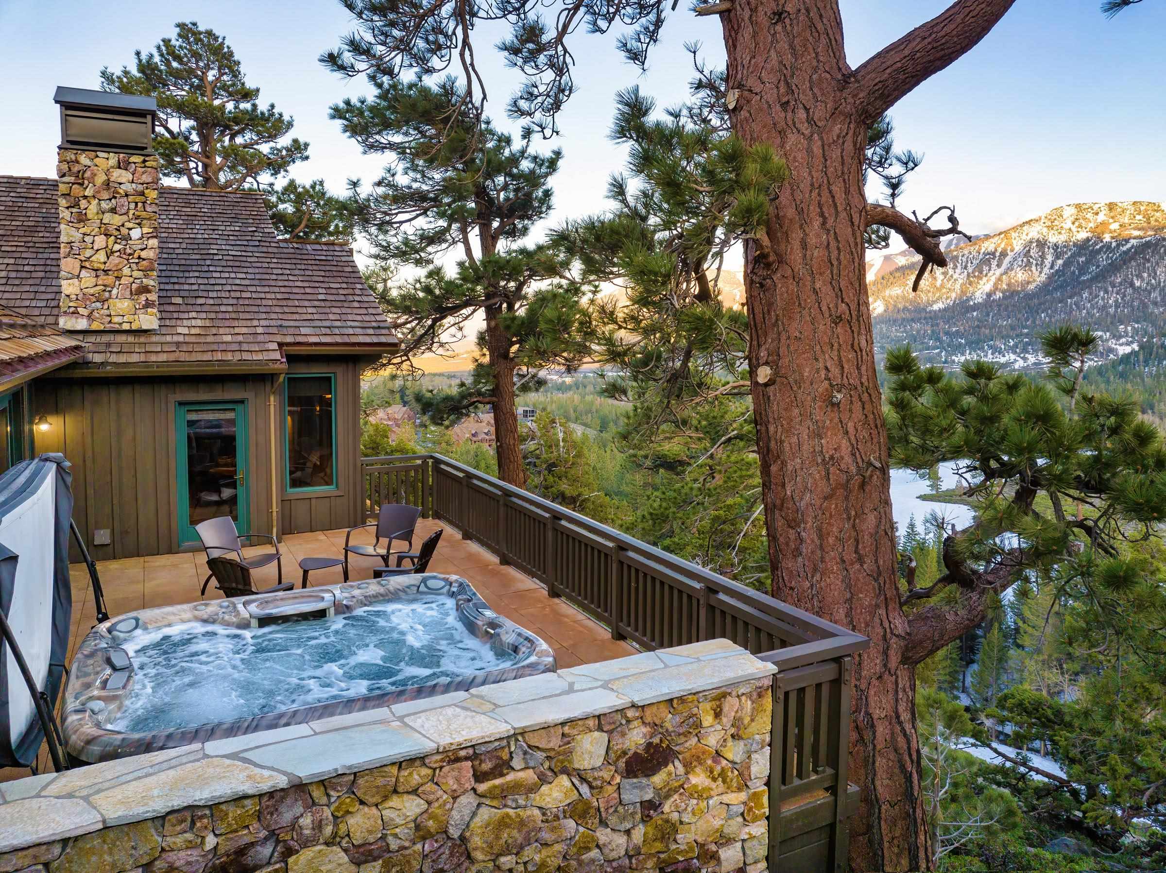 285 Juniper Road Mammoth Lakes, CA 93546 - Photo 10 of 38 a balcony with wooden floor and outdoor seating