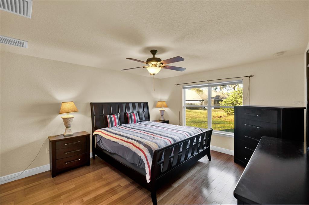 4319 Southwest 63rd Street Ocala, FL 34474 - Photo 14 of 29 a bedroom with a bed and window