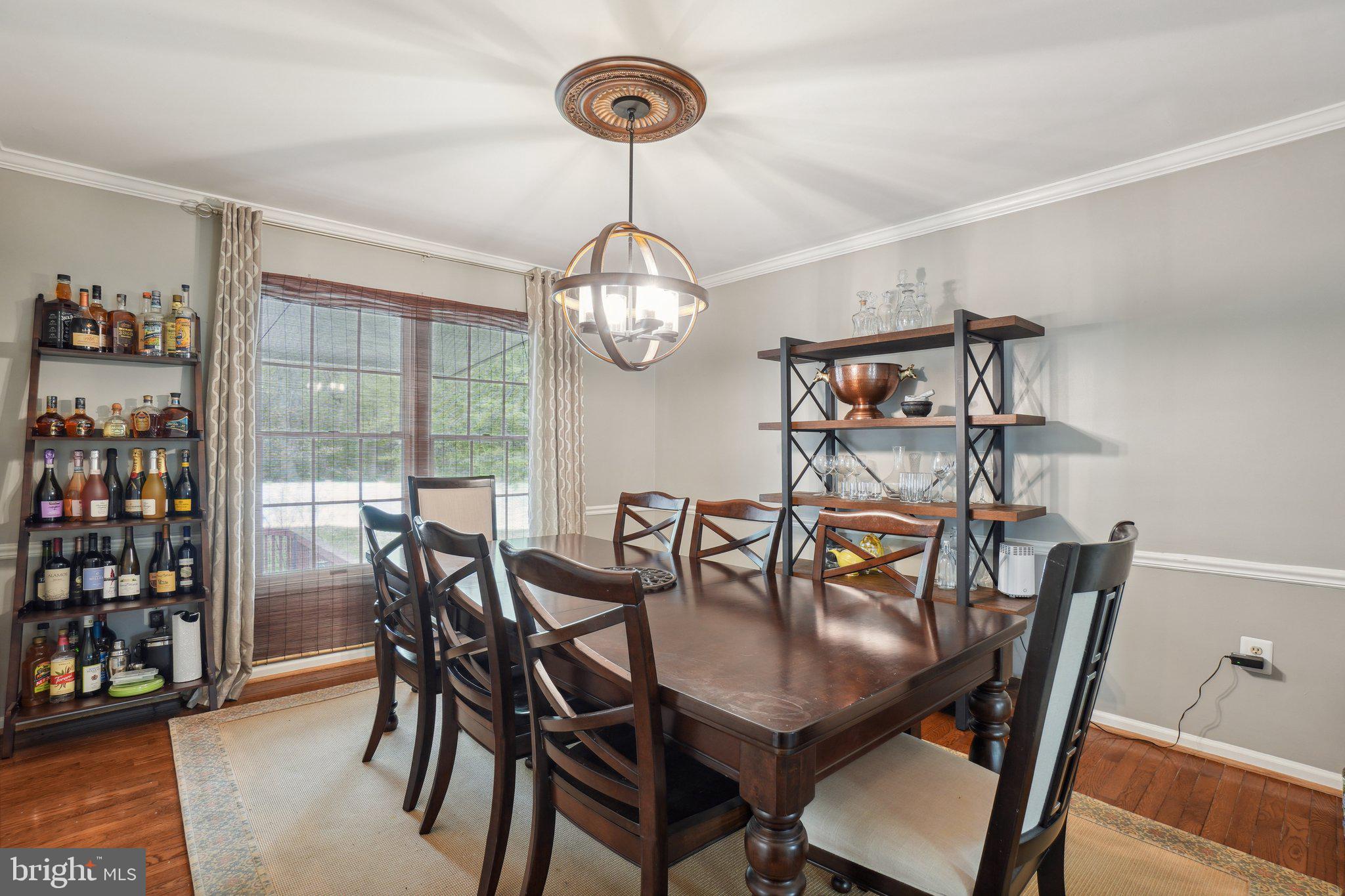 10604 Cannonview Court Fort Washington, MD 20744 - Photo 15 of 50 a view of a dining room with furniture and chandelier