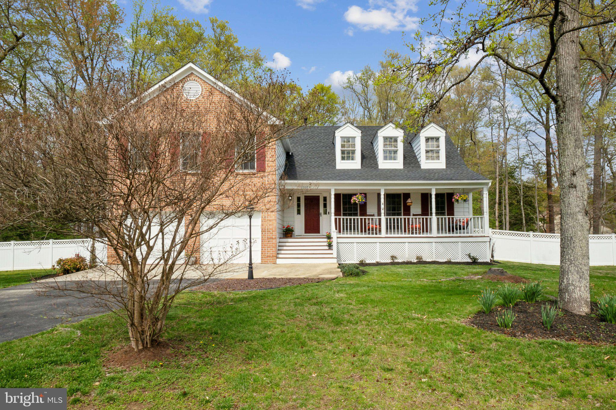 10604 Cannonview Court Fort Washington, MD 20744 - Photo 35 of 50 a front view of a house with a yard