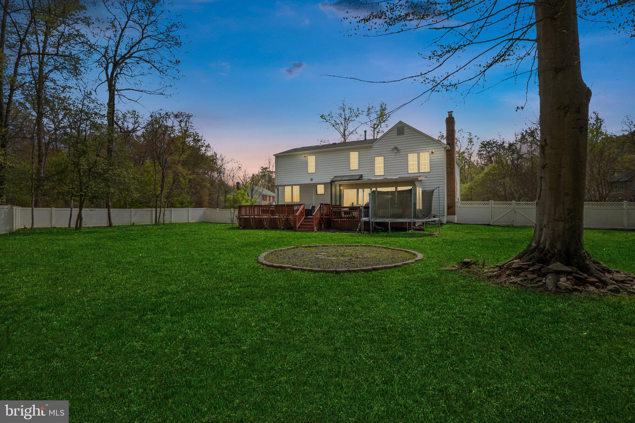 10604 Cannonview Court Fort Washington, MD 20744 - Photo 37 of 50 a view of a big yard with plants and large trees