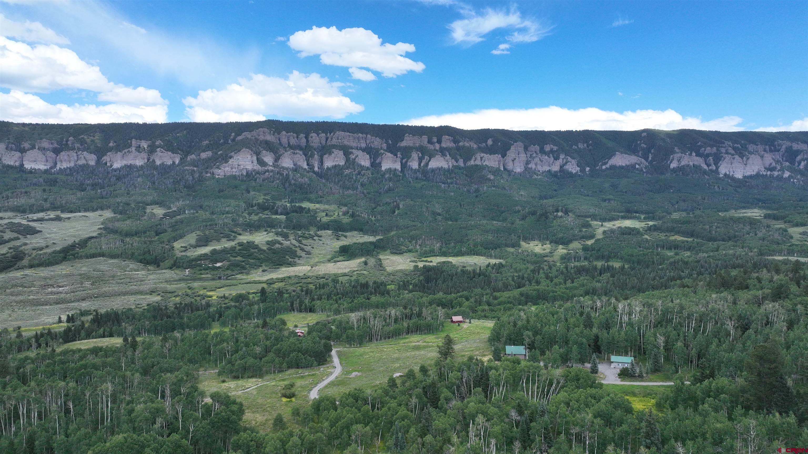 1073 Hampton Road Montrose, CO 81403 - Photo 19 of 26 a view of a house with a yard