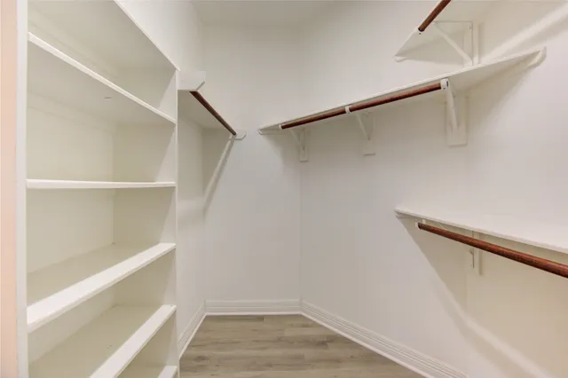 a view of a room with racks on the wall