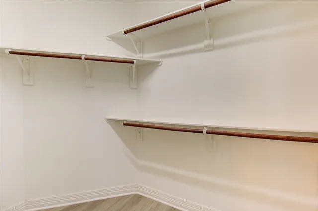 a view of a hallway with closet