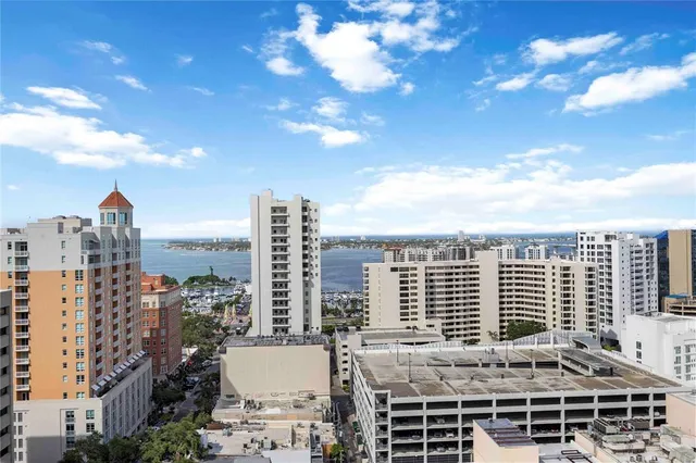 a view of a city with tall buildings