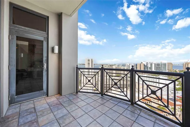 a view of a terrace with city view