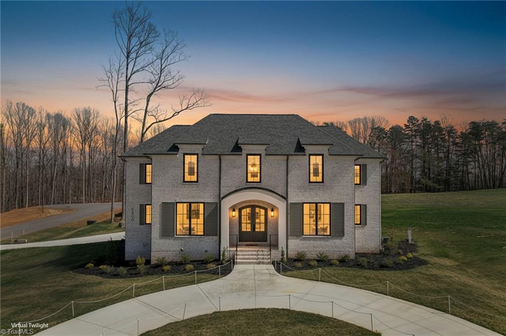 6806 Brennan Way Oak Ridge, NC 27310 - Photo 49 of 50 twilight lighting, virtually created