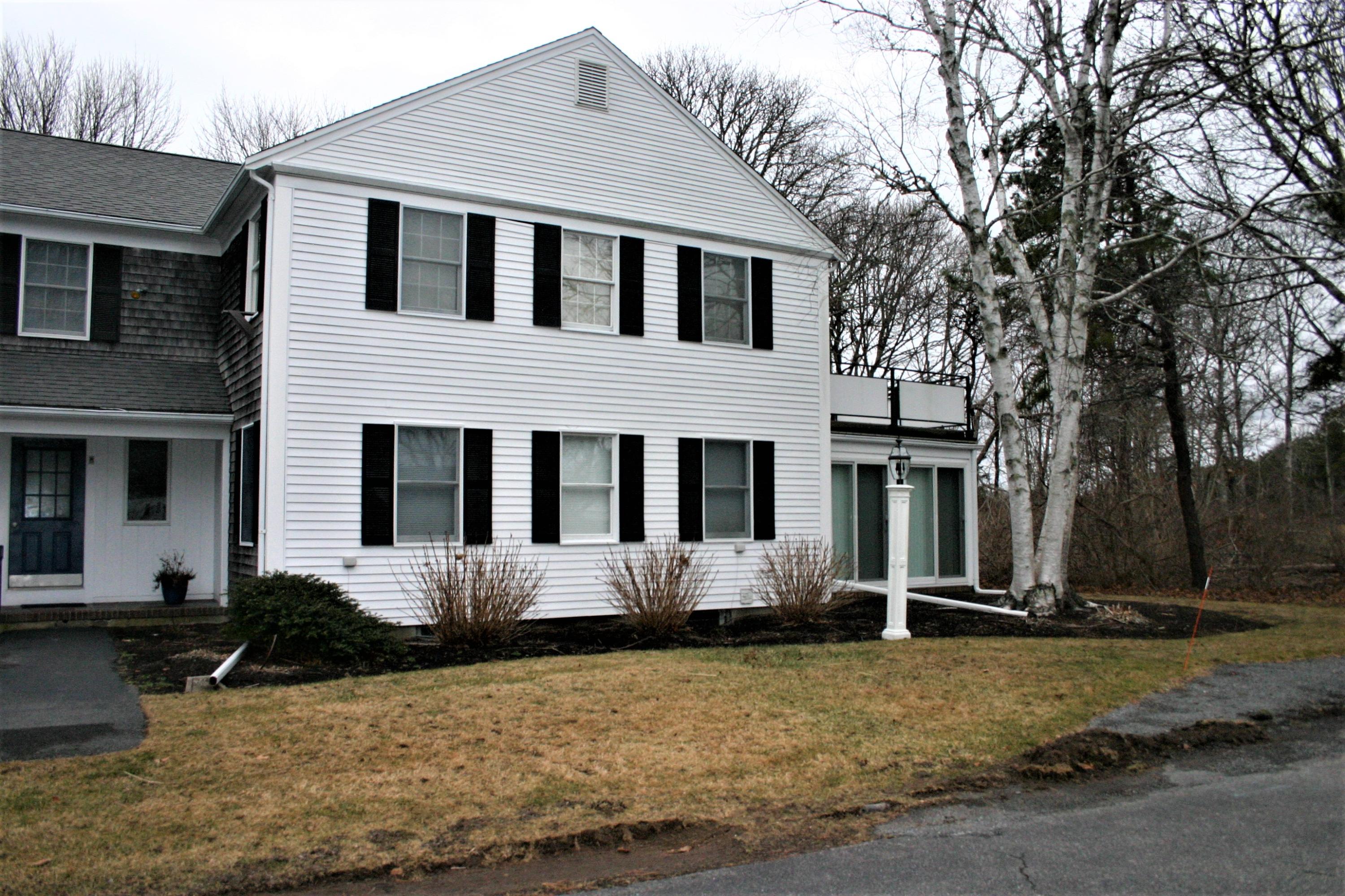 a front view of house with yard