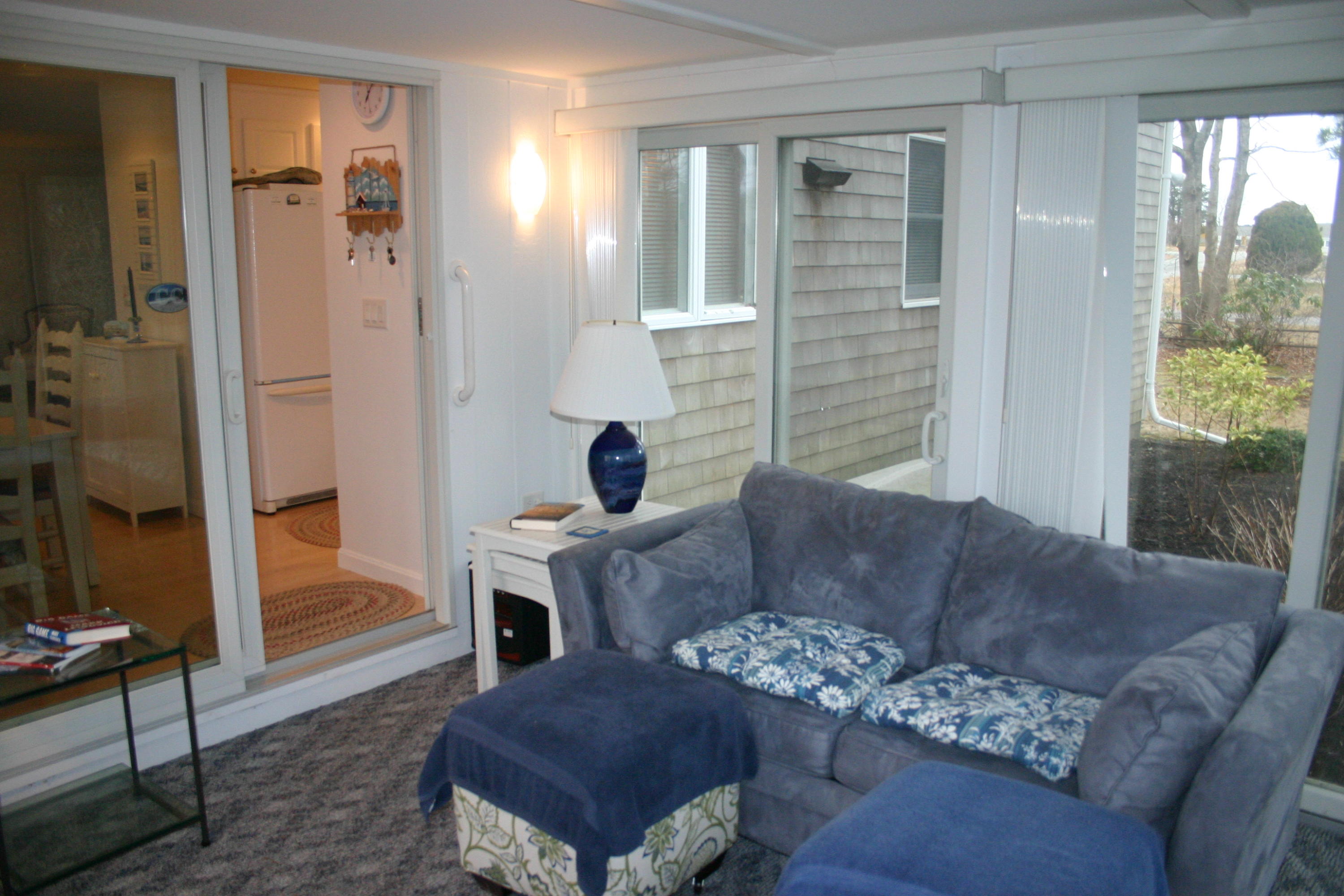 93 Depot Road, Unit 10 Chatham, MA 02633 - Photo 11 of 16 a living room with furniture and a window