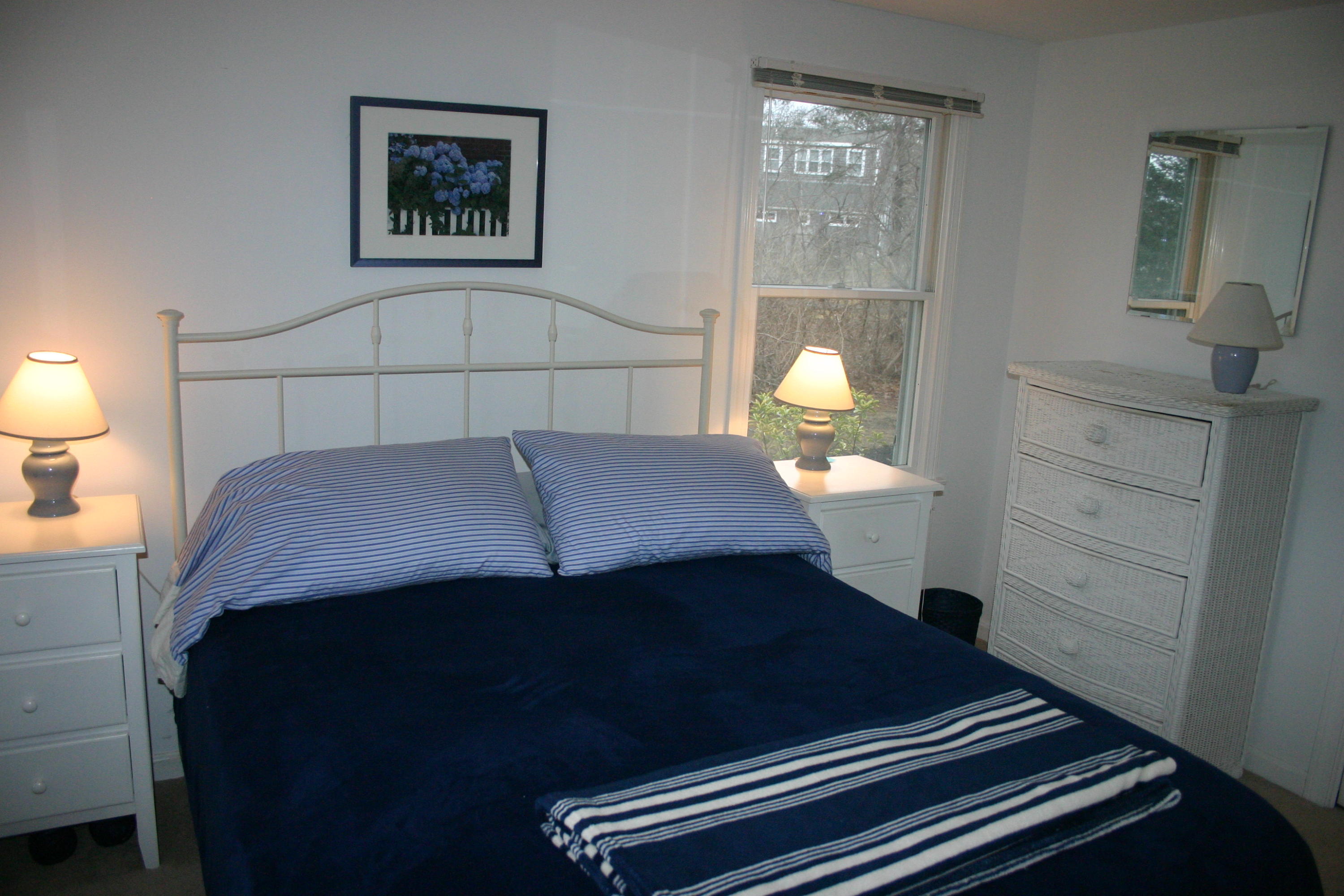 93 Depot Road, Unit 10 Chatham, MA 02633 - Photo 15 of 16 a bedroom with a bed and window