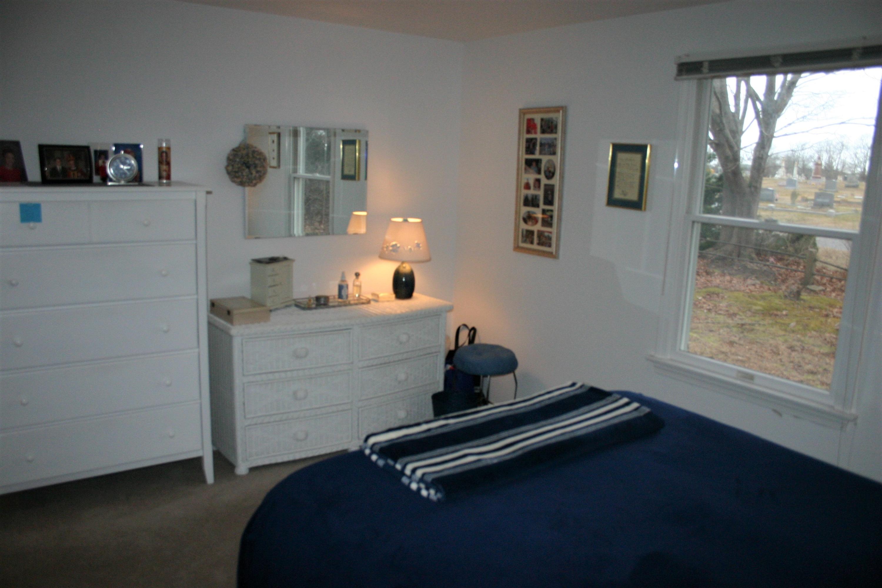 93 Depot Road, Unit 10 Chatham, MA 02633 - Photo 16 of 16 a room with gym equipment and a large window