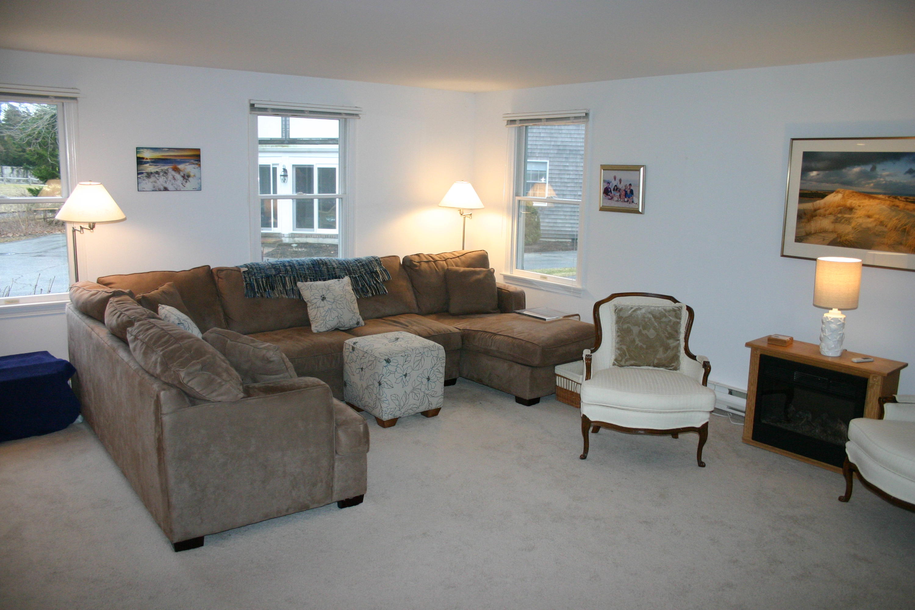 93 Depot Road, Unit 10 Chatham, MA 02633 - Photo 3 of 16 a living room with furniture and a window