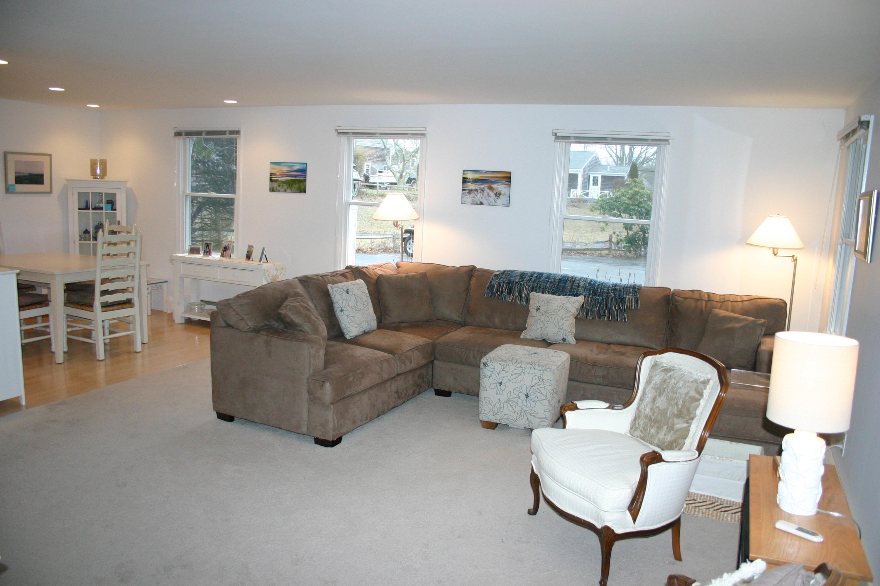 93 Depot Road, Unit 10 Chatham, MA 02633 - Photo 4 of 16 a living room with furniture and a window