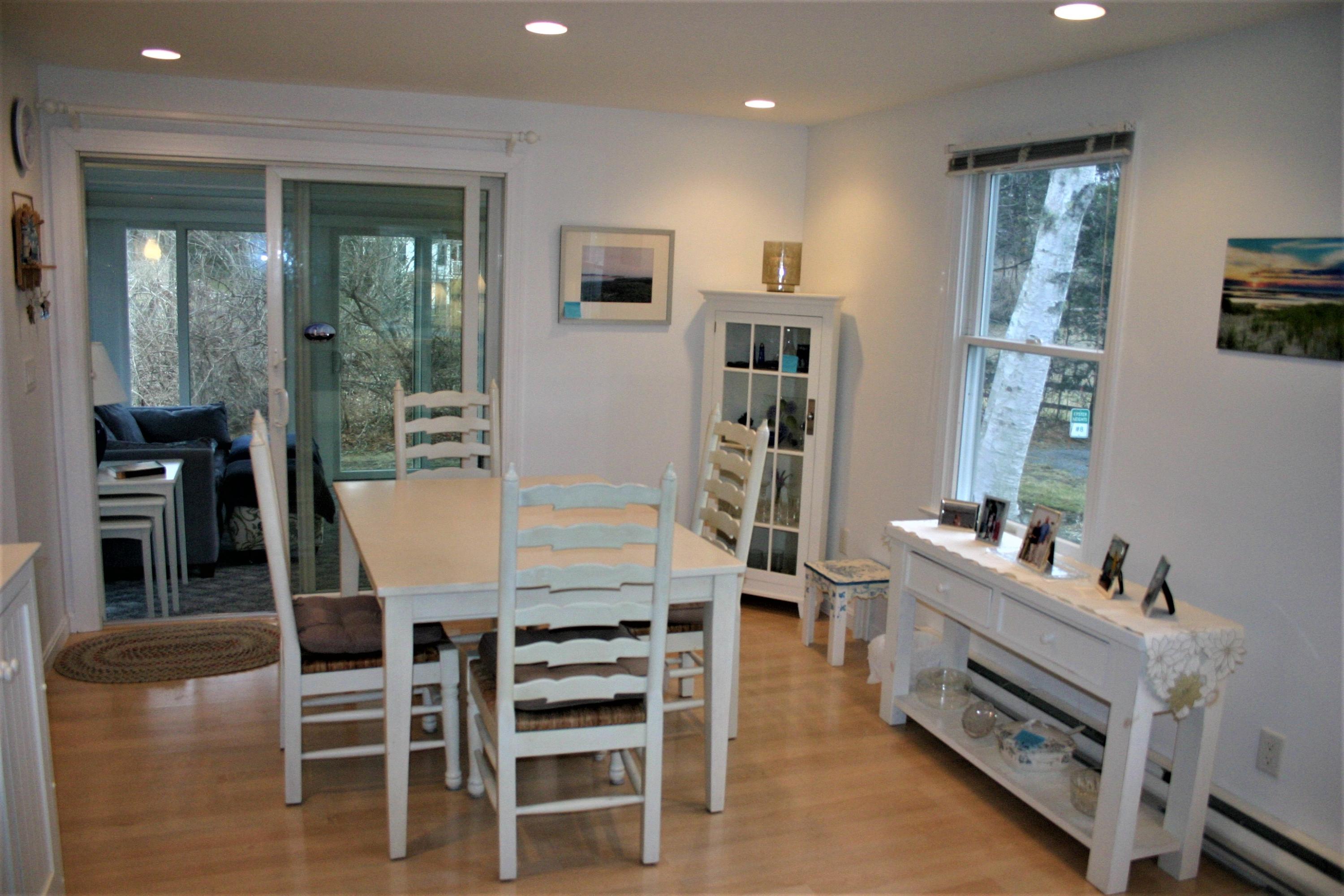 93 Depot Road, Unit 10 Chatham, MA 02633 - Photo 7 of 16 a dining room with furniture and window