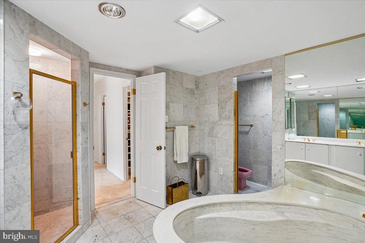 800 25th Street Northwest, Unit 504 Washington, DC 20037 - Photo 40 of 52 Elegant marble bathroom retreat.