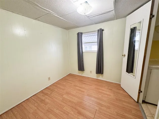 a bathroom with a sink mirror vanity and toilet