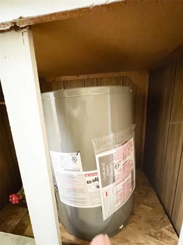 a kitchen with stainless steel appliances a refrigerator a sink a stove a microwave a counter space and cabinets