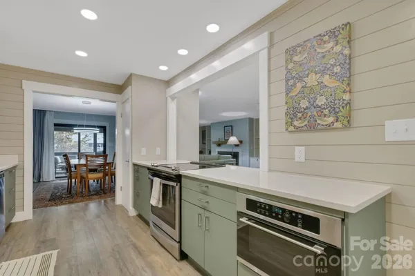 a room with a cabinets and a sink
