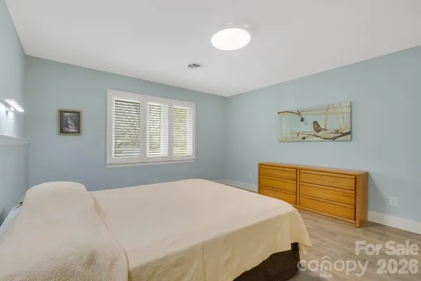 a workspace with furniture and window