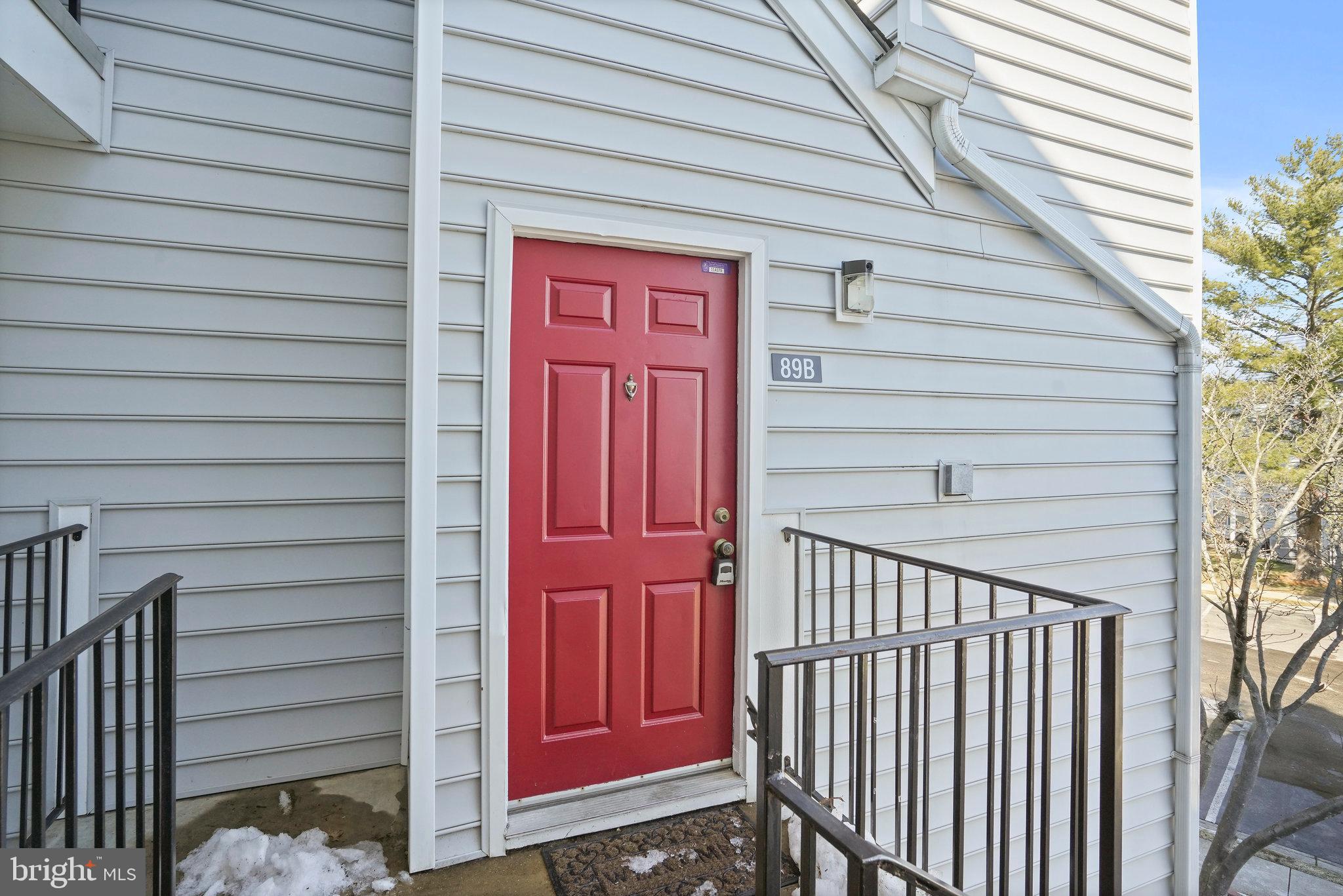 14023 Vista Drive, Unit 89 Laurel, MD 20707 - Photo 20 of 26 a view of a house with a door and wooden walls