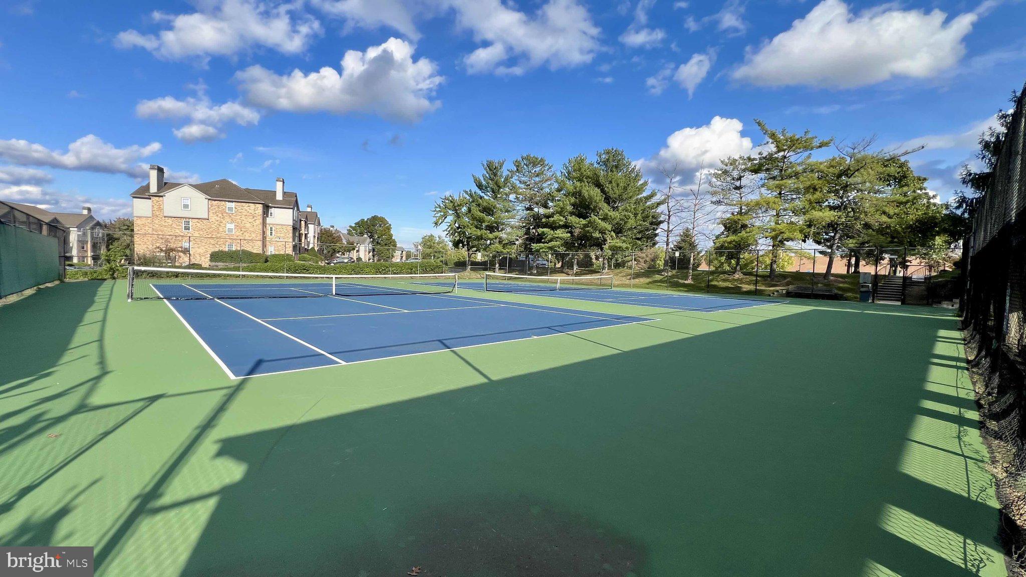 14023 Vista Drive, Unit 89 Laurel, MD 20707 - Photo 24 of 26 a view of a tennis court
