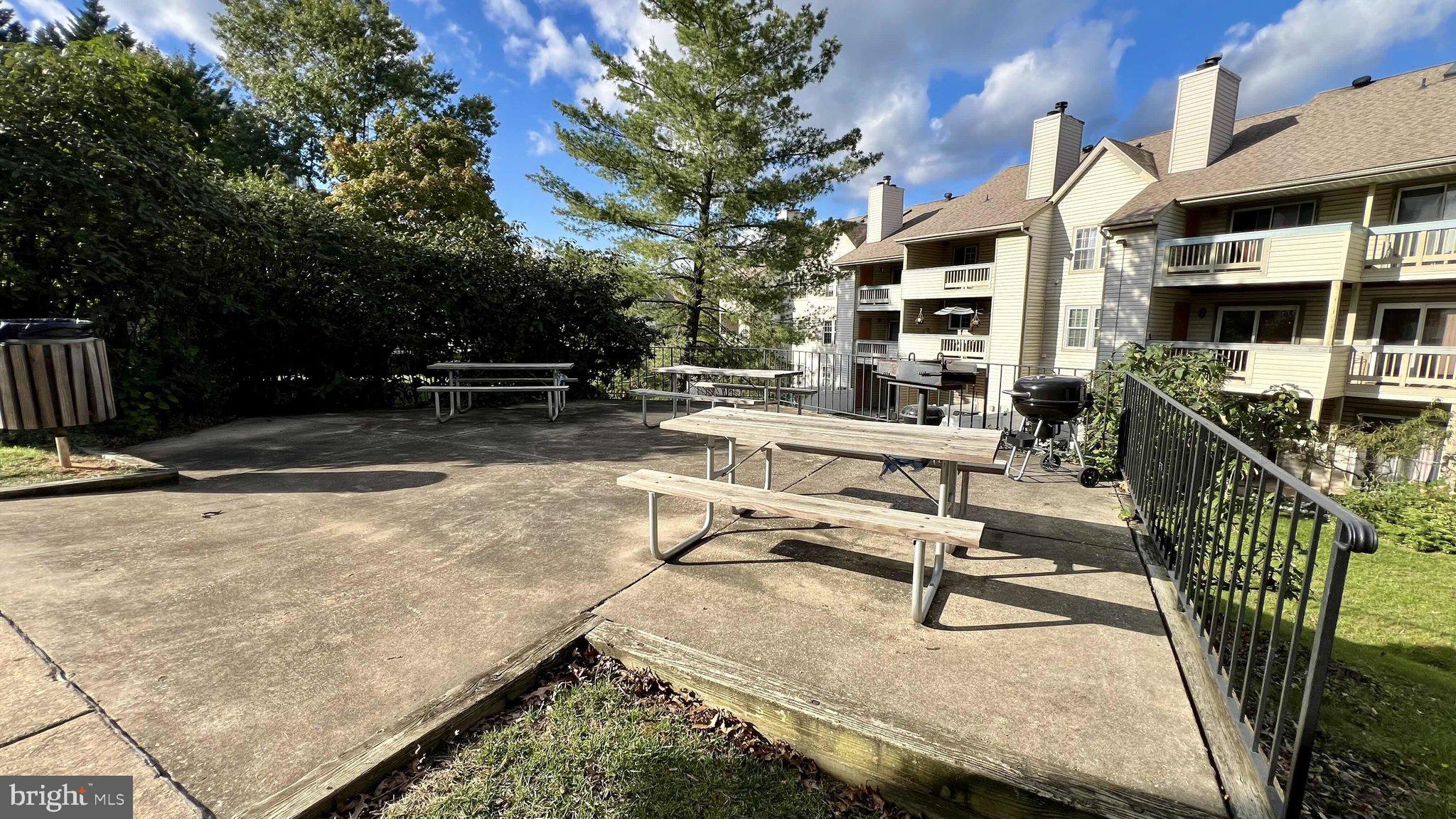 14023 Vista Drive, Unit 89 Laurel, MD 20707 - Photo 26 of 26 a view of a swimming pool with a lounge chair