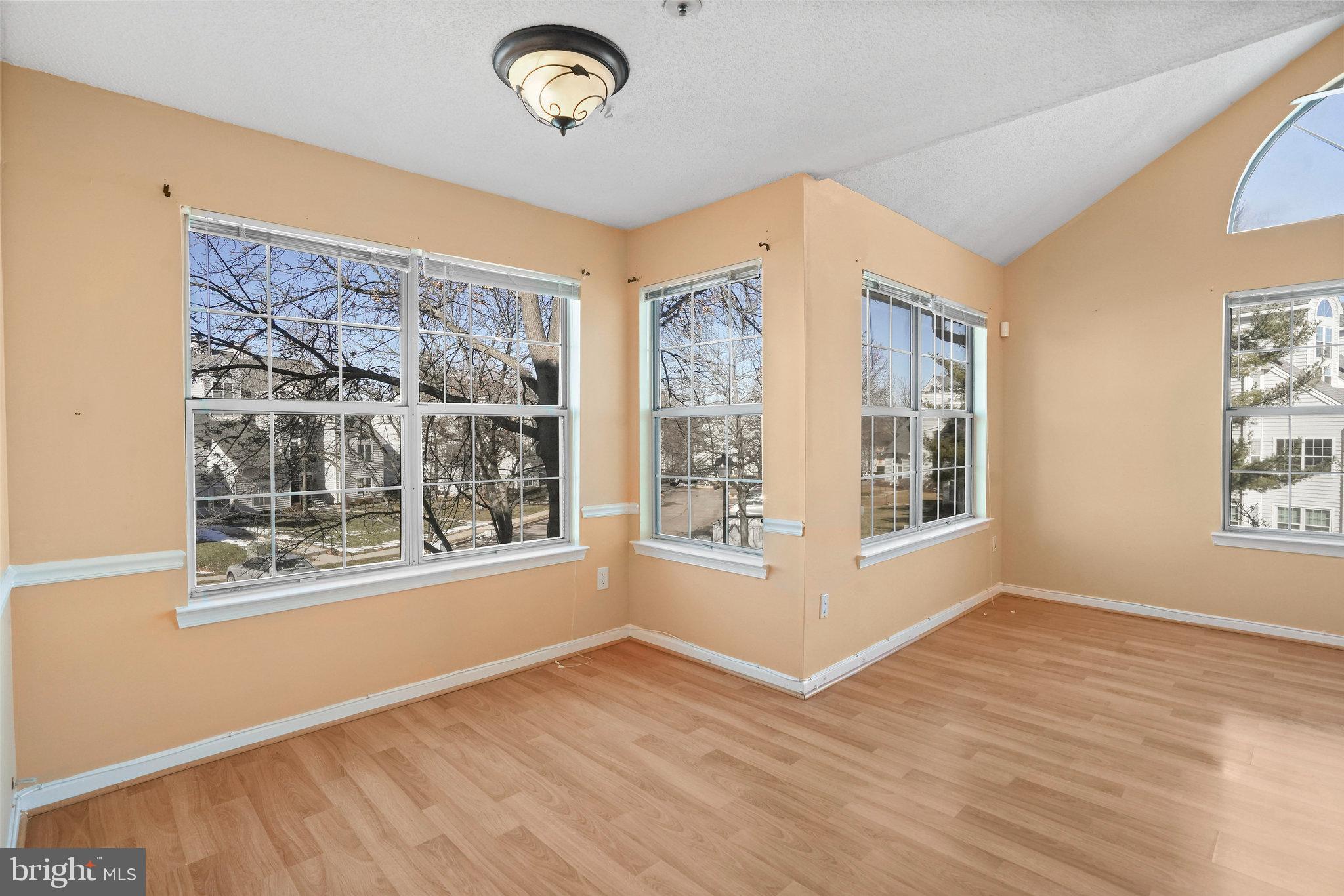 14023 Vista Drive, Unit 89 Laurel, MD 20707 - Photo 5 of 26 a view of an empty room with a window
