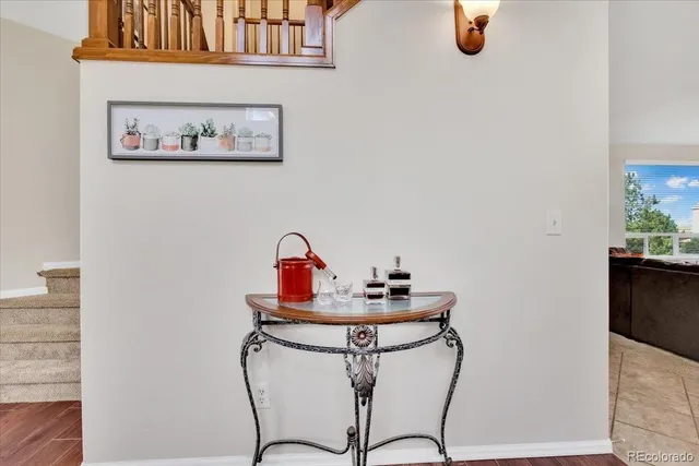 a view of a hallway with paintings on the wall