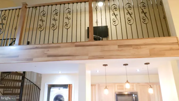 a view of a entryway with wooden floor