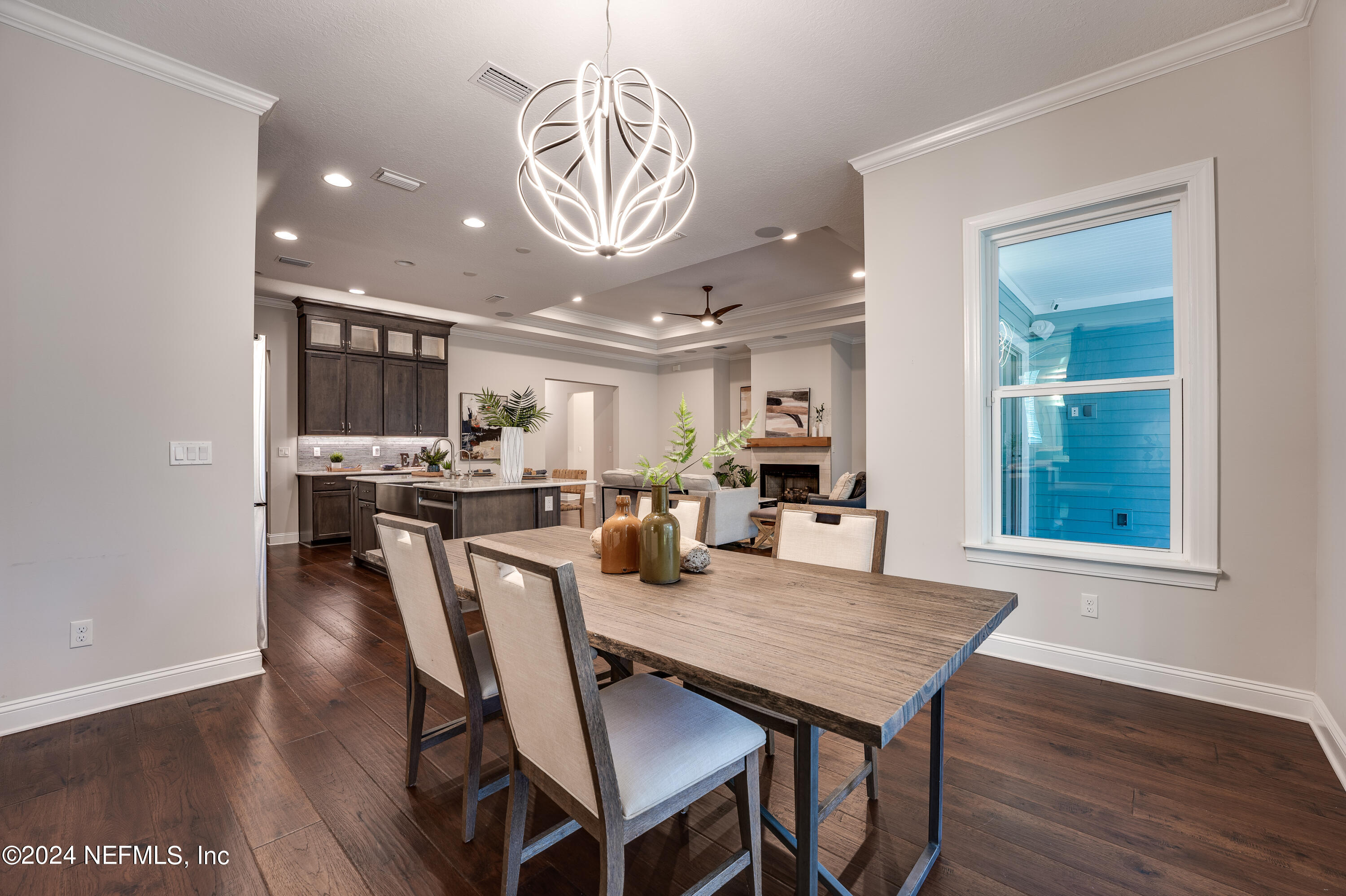 257 Glenneyre Circle St. Augustine, FL 32092 - Photo 21 of 98 a view of a dining room with furniture window and wooden floor