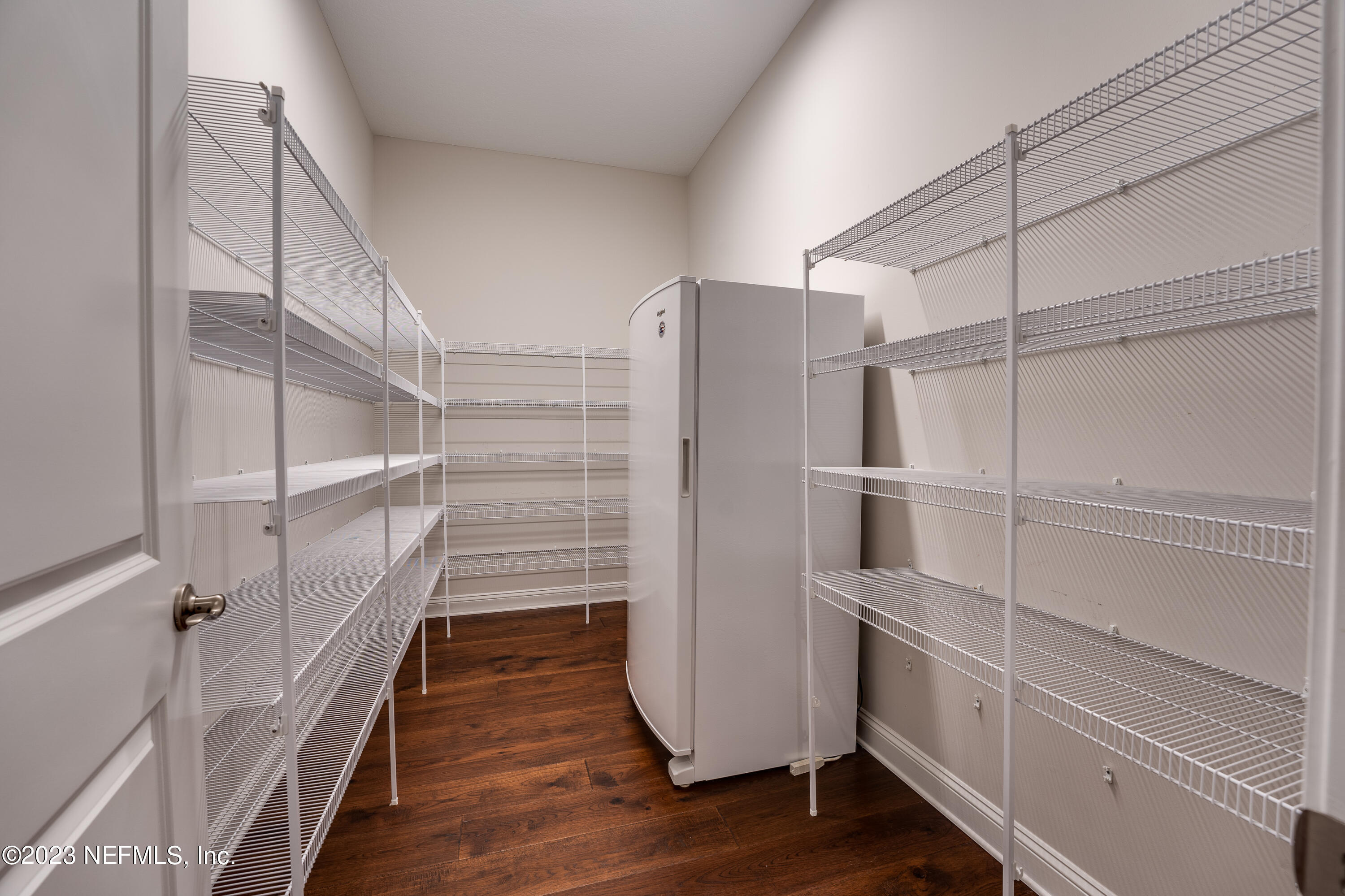 257 Glenneyre Circle St. Augustine, FL 32092 - Photo 23 of 98 a view of walk in closet with empty racks