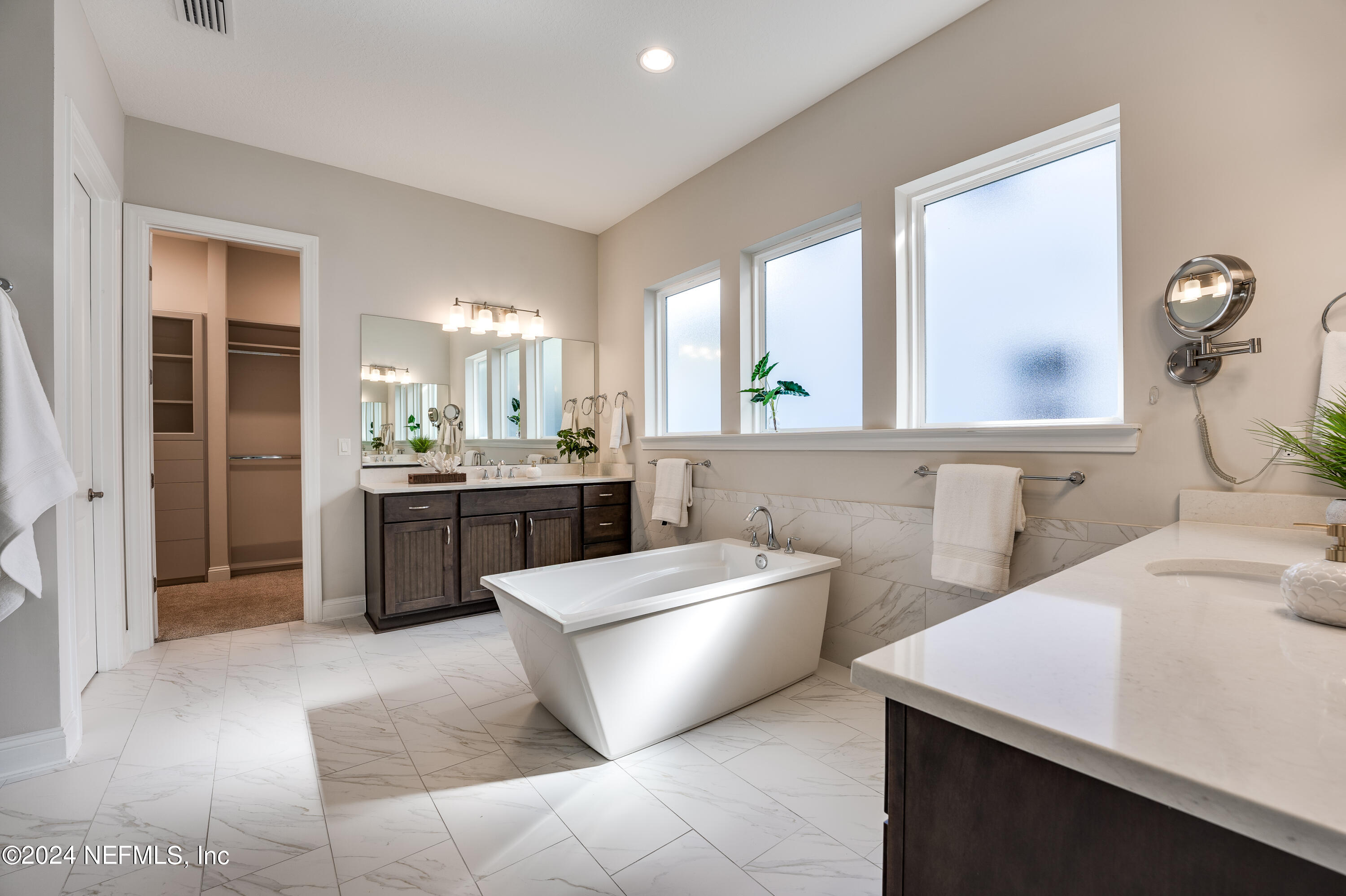 257 Glenneyre Circle St. Augustine, FL 32092 - Photo 26 of 98 a kitchen with a sink a counter top space and appliances