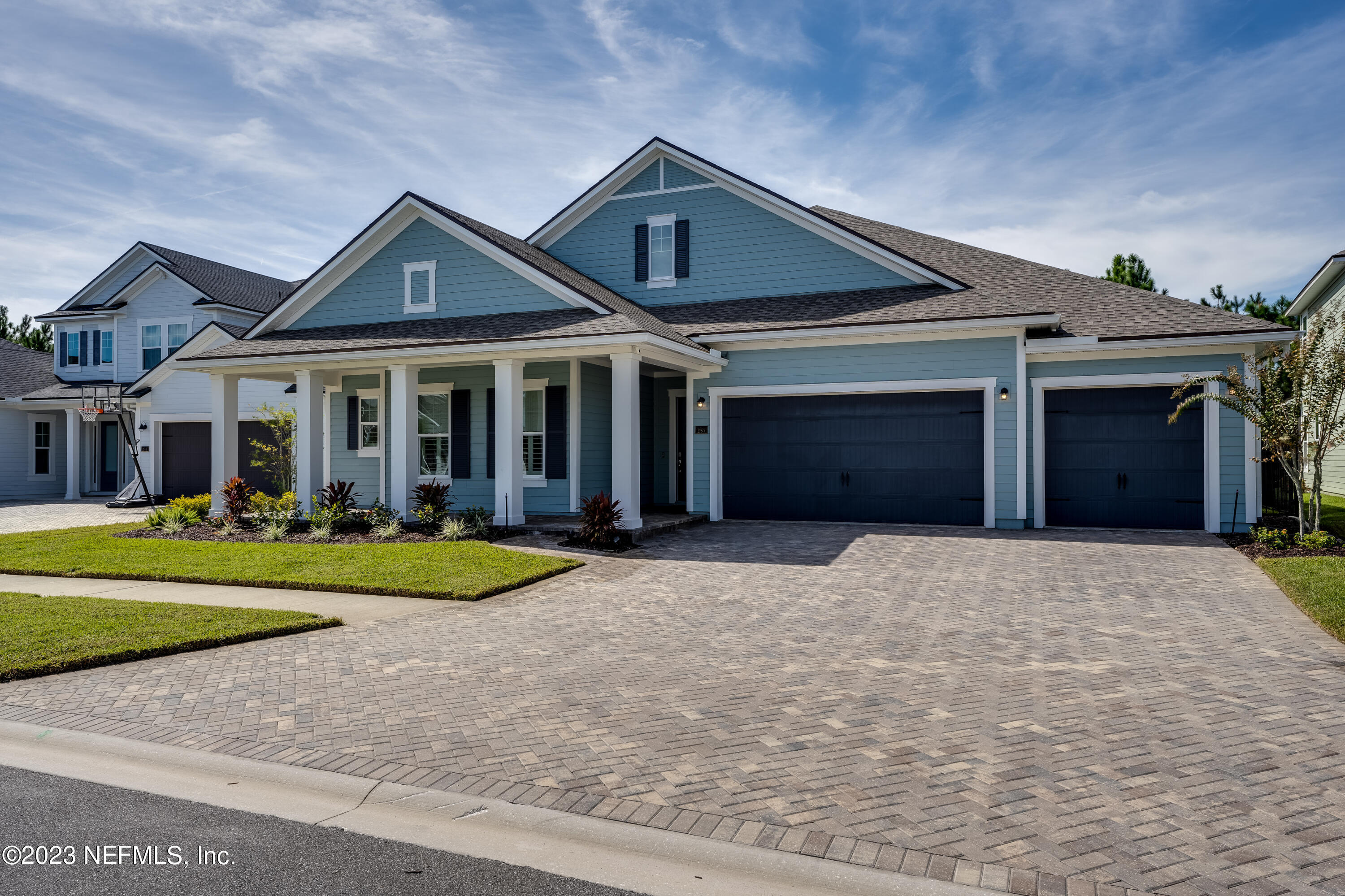 257 Glenneyre Circle St. Augustine, FL 32092 - Photo 3 of 98 a front view of a house with a yard and garage