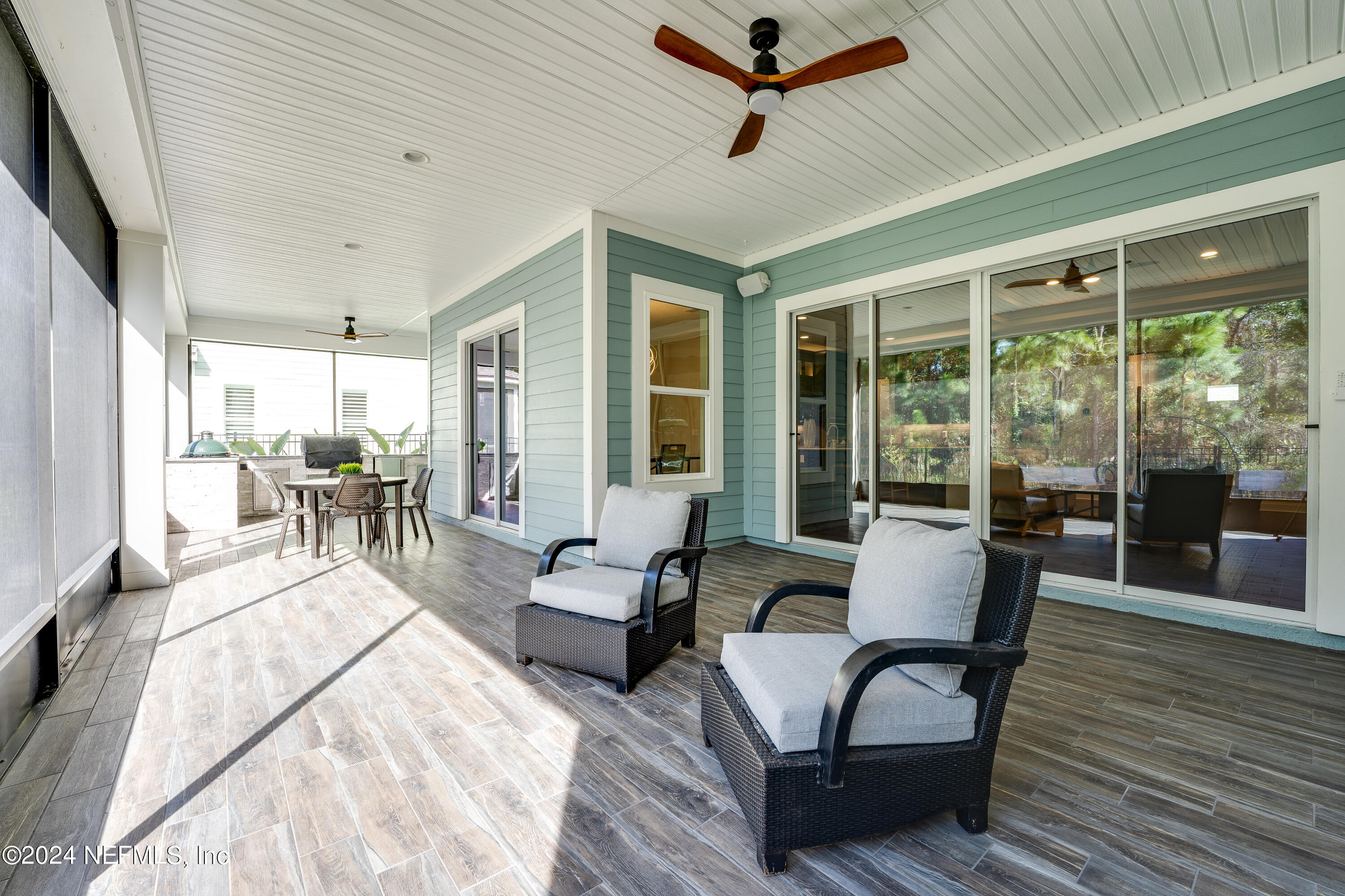 257 Glenneyre Circle St. Augustine, FL 32092 - Photo 45 of 98 a living room with furniture and a large window