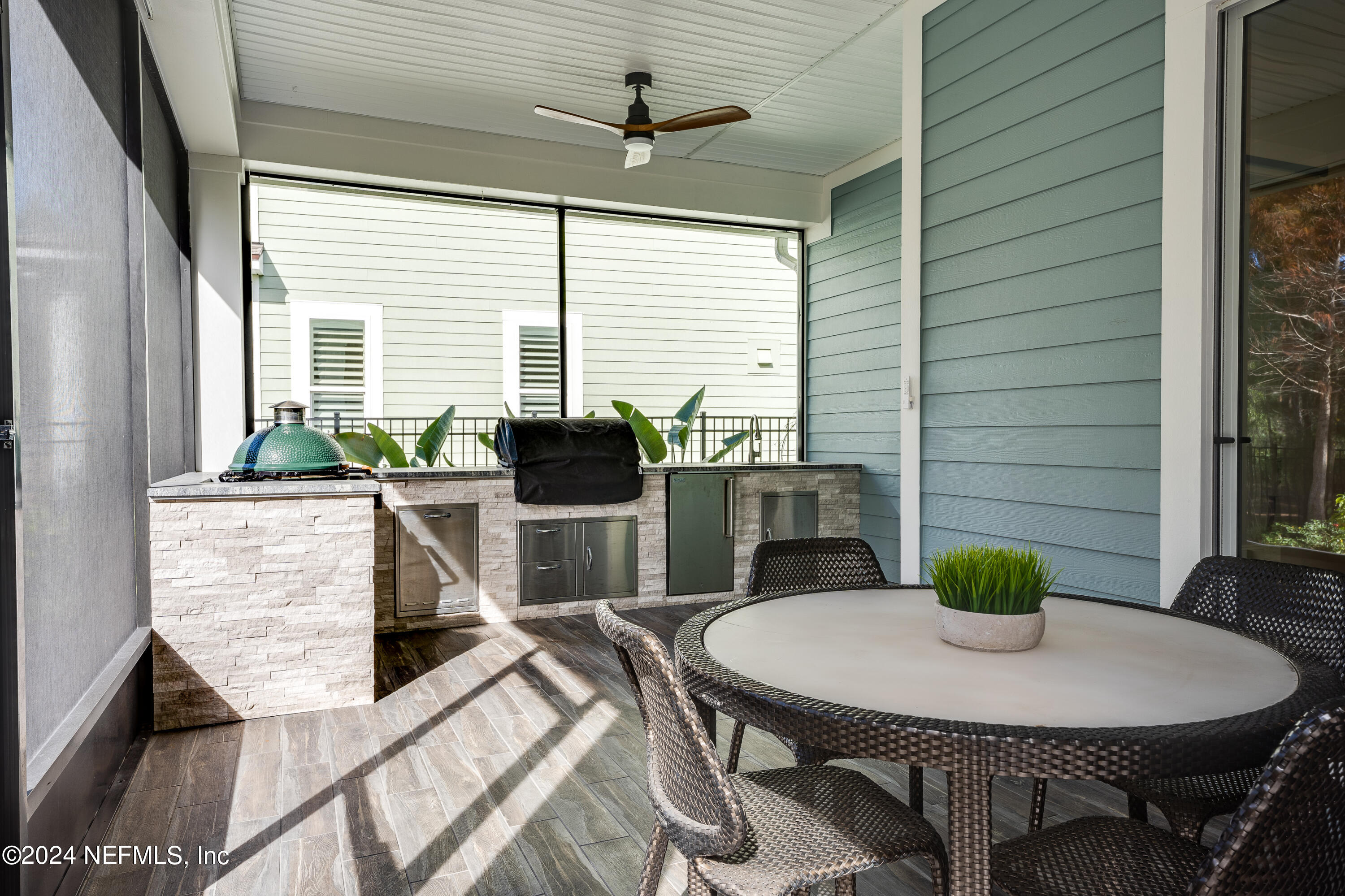 257 Glenneyre Circle St. Augustine, FL 32092 - Photo 47 of 98 a living room with furniture a window and a table