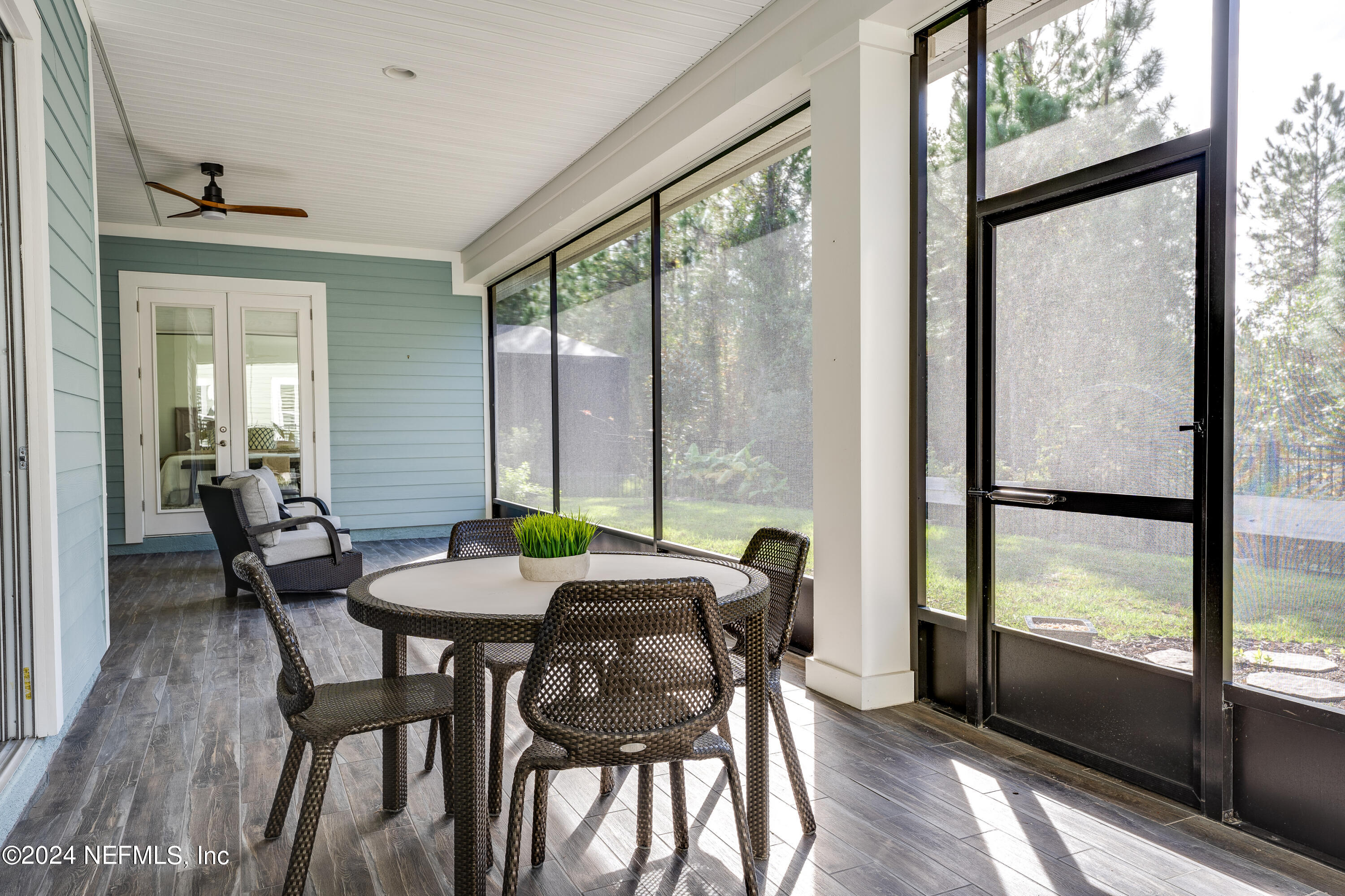257 Glenneyre Circle St. Augustine, FL 32092 - Photo 48 of 98 a view of a dining room with furniture window and wooden floor
