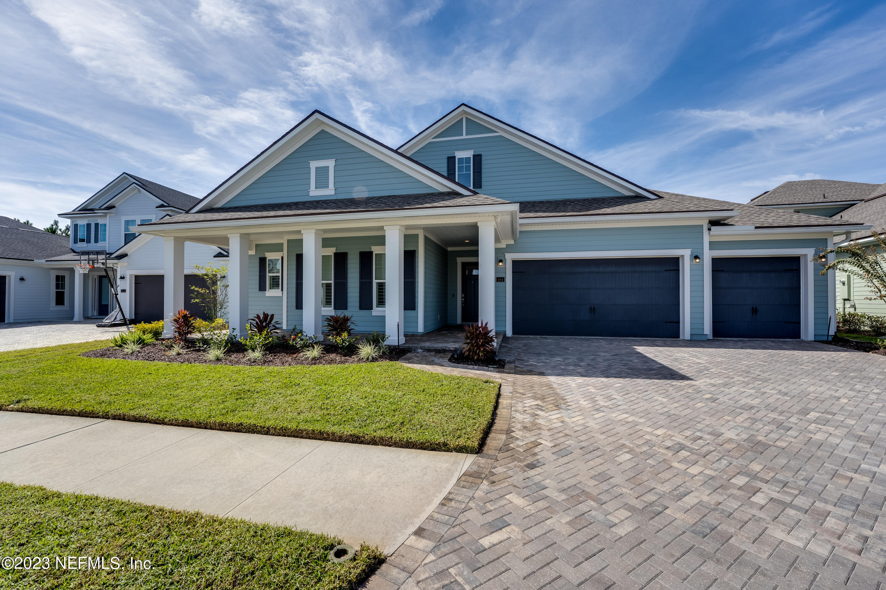 257 Glenneyre Circle St. Augustine, FL 32092 - Photo 5 of 98 a front view of a house with a yard and garage