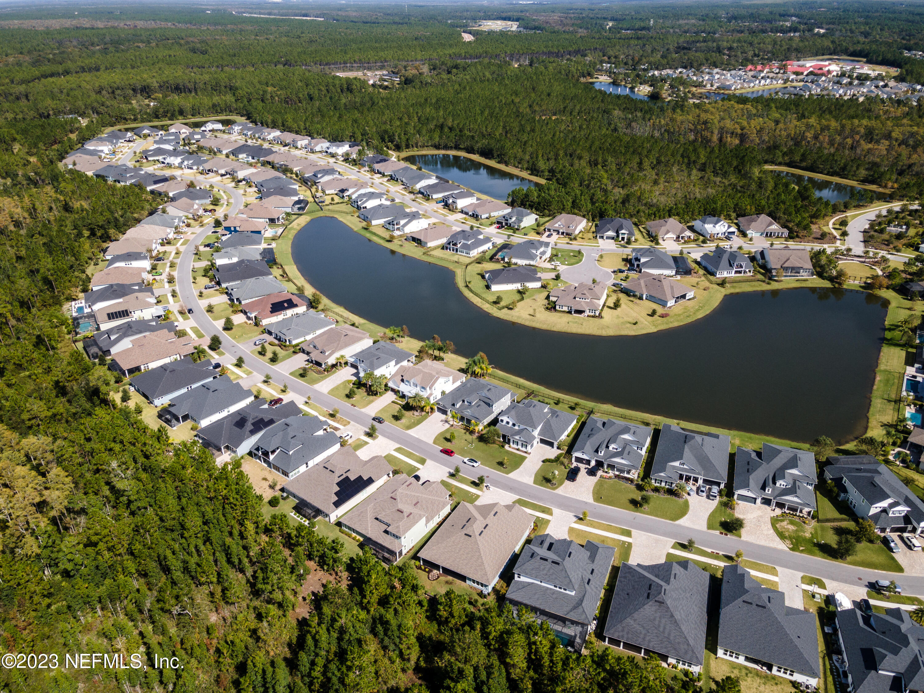 257 Glenneyre Circle St. Augustine, FL 32092 - Photo 64 of 98 an aerial view of a house with a lake view