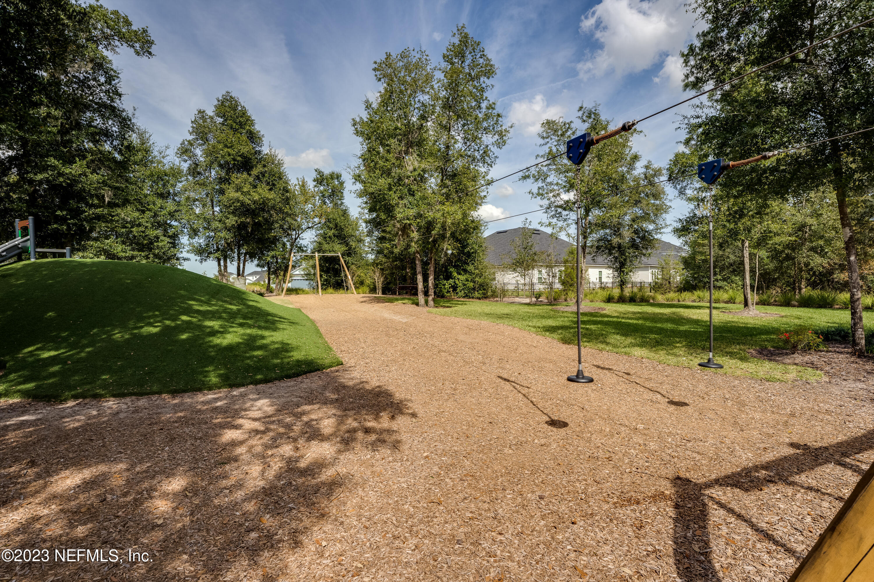 257 Glenneyre Circle St. Augustine, FL 32092 - Photo 90 of 98 a view of a street with a yard