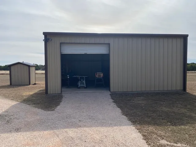 a dining room with furniture and a window
