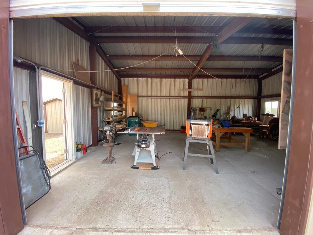 1320 County Road 304 Bertram, TX 78605 - Photo 20 of 38 a view of a room with gym equipment