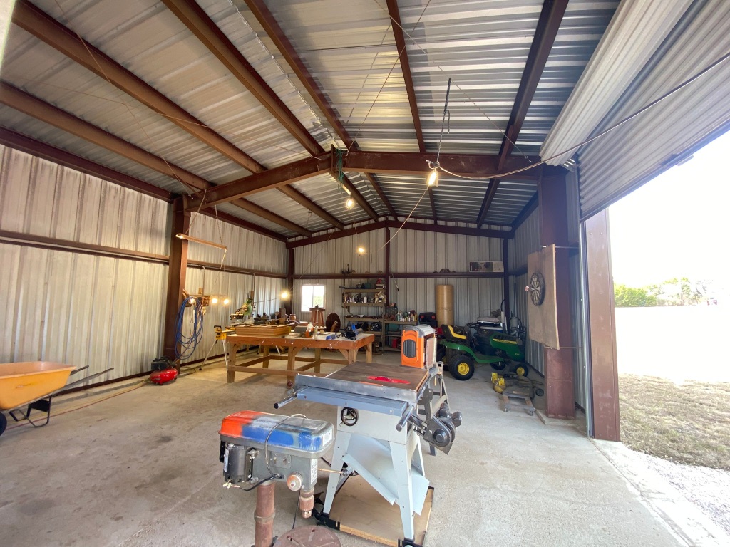 1320 County Road 304 Bertram, TX 78605 - Photo 21 of 38 a outdoor space with lots of furniture