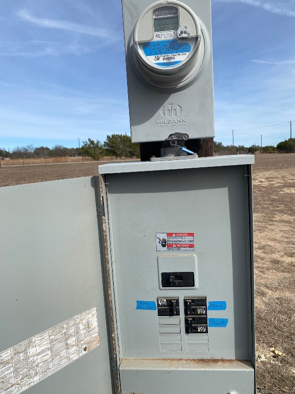 1320 County Road 304 Bertram, TX 78605 - Photo 25 of 38 a view of a fireplace with a sink