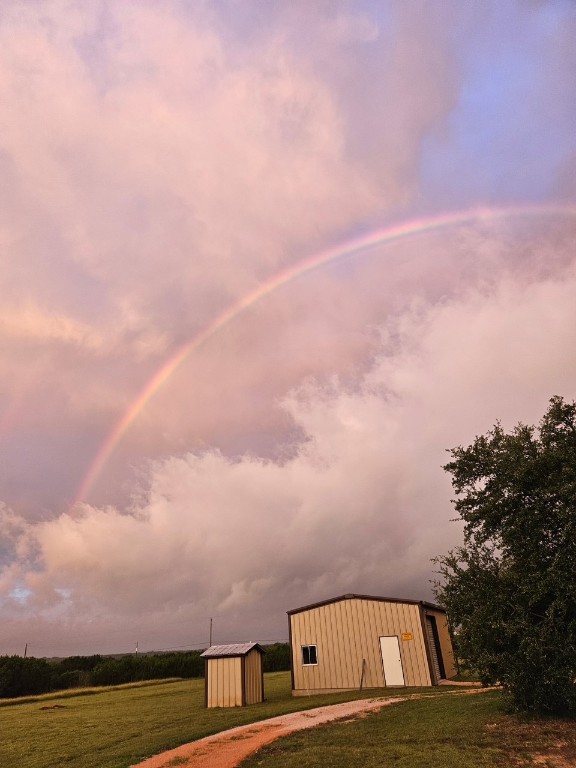 1320 County Road 304 Bertram, TX 78605 - Photo 3 of 38 a view of ocean with sunset