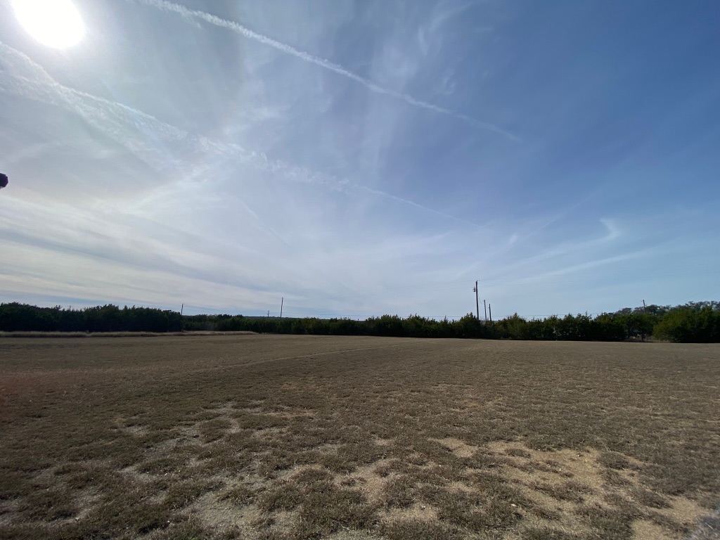 1320 County Road 304 Bertram, TX 78605 - Photo 7 of 38 a view of a lake and sunset