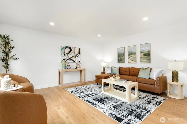 a living room with furniture or couch and a window