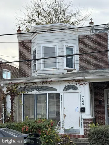 front view of a house with a windows