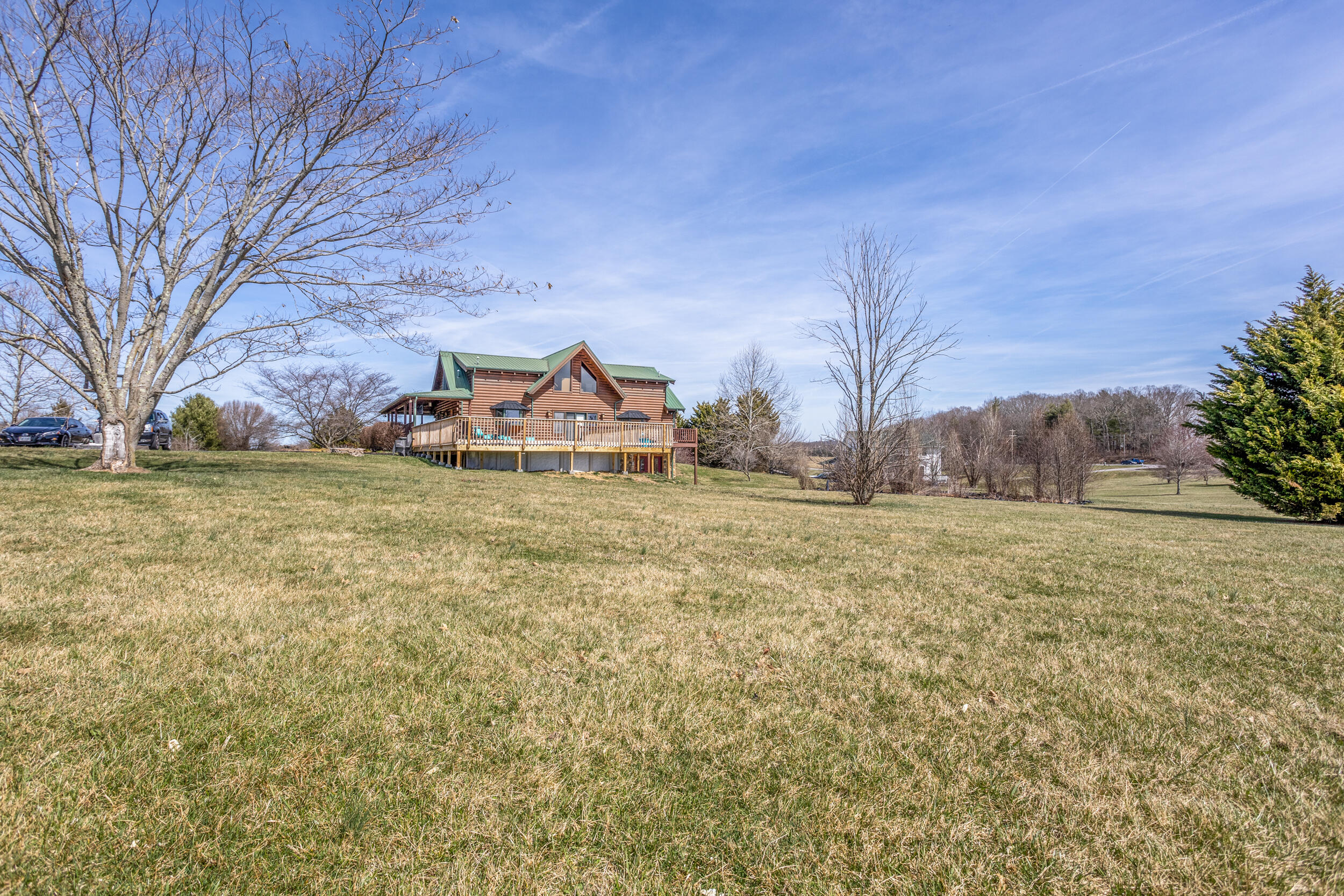 1955 Wetherburn Road Christiansburg, VA 24073 - Photo 24 of 27 a view of a house with a yard