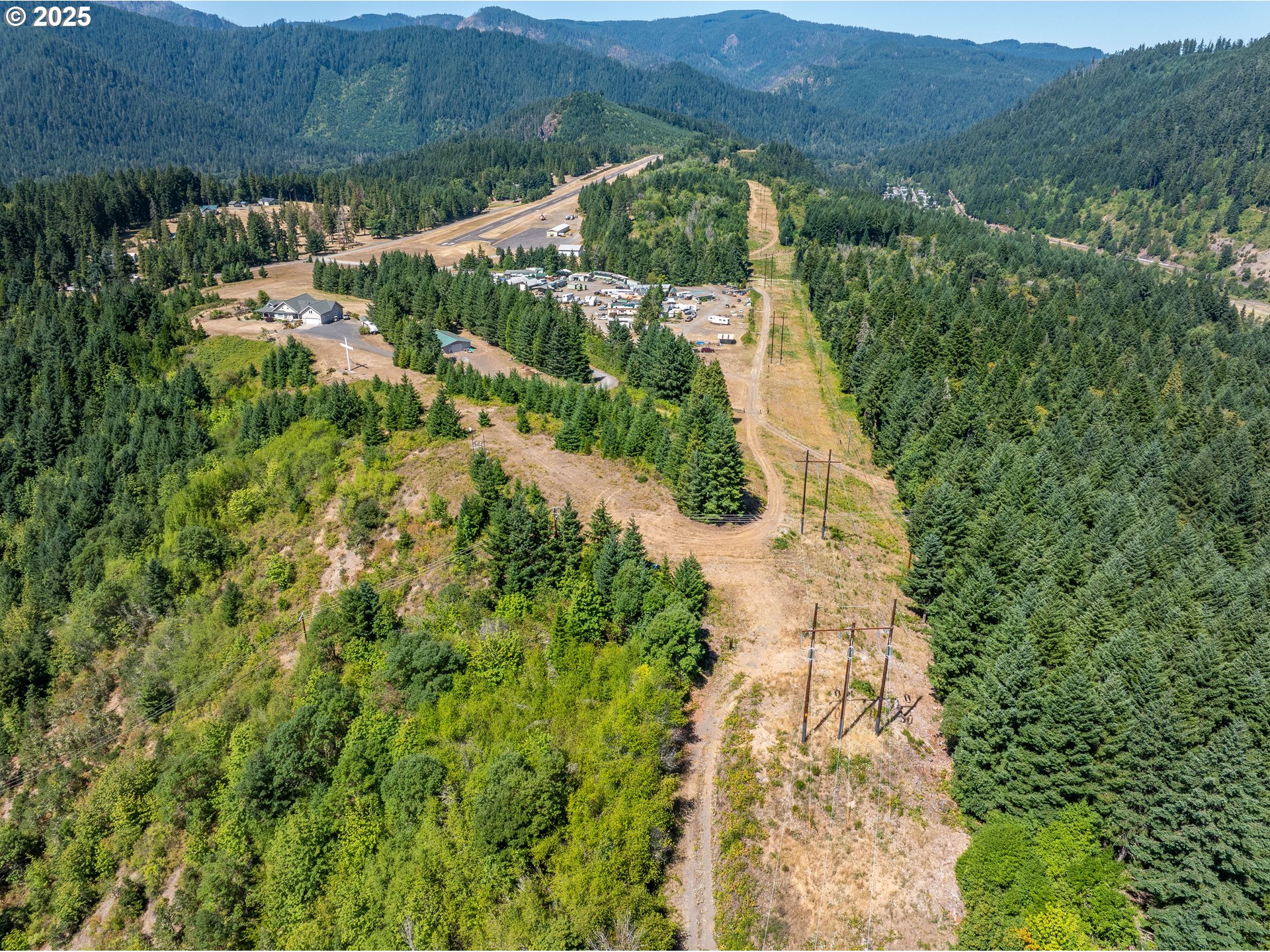 0 West 2nd Street Oakridge, OR 97463 - Photo 14 of 25 an aerial view of residential house with outdoor space and trees all around